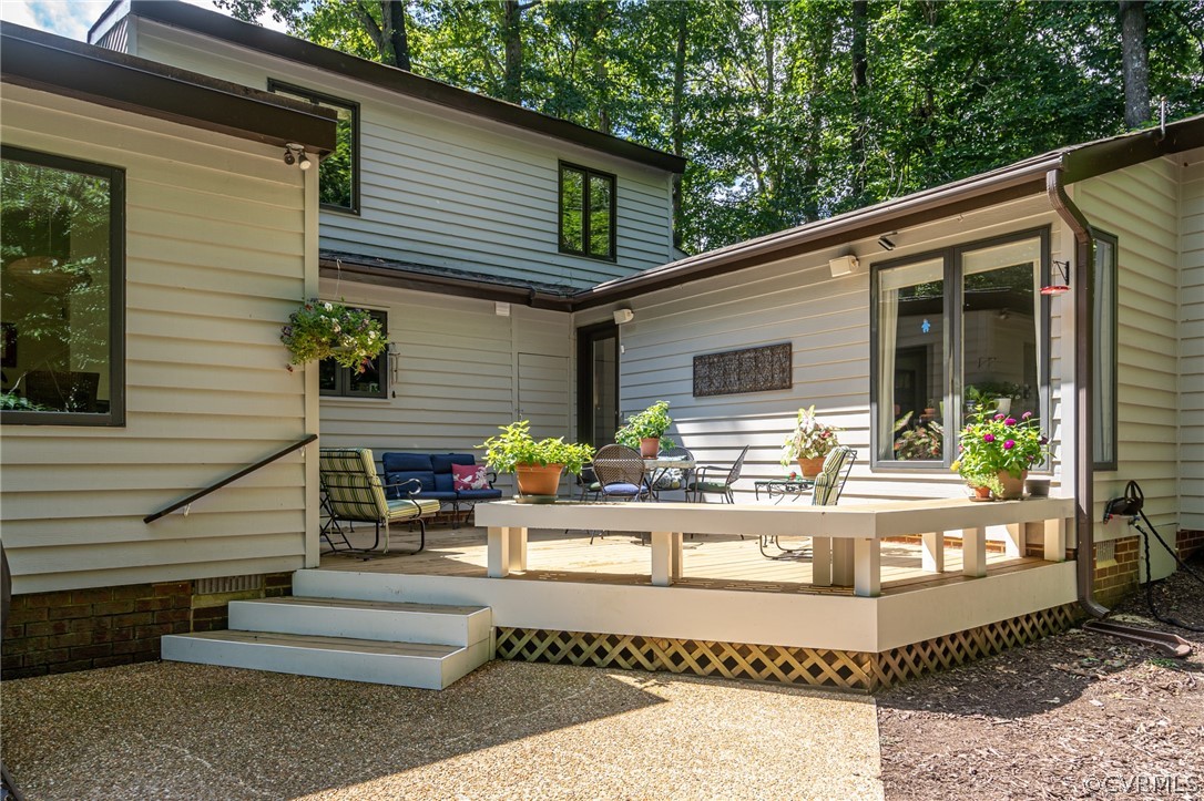 133 Daingerfield Road Williamsburg, VA 23185 - Photo 2 of 39 The back deck extends the living space overlooking