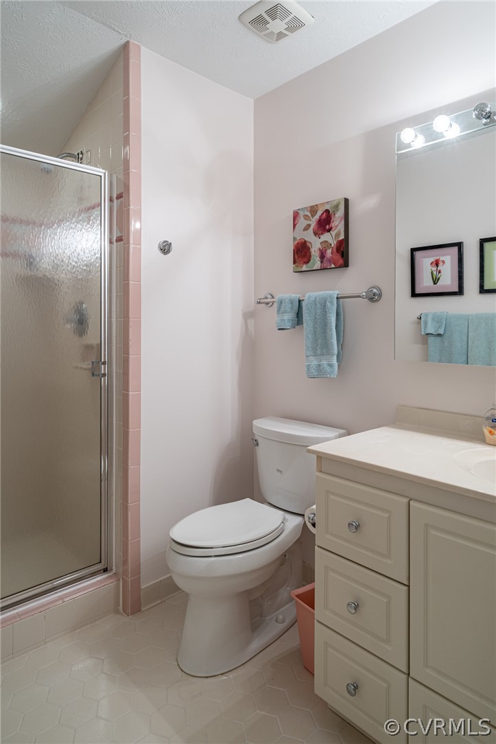 133 Daingerfield Road Williamsburg, VA 23185 - Photo 25 of 39 Tiled shower, updated vanity