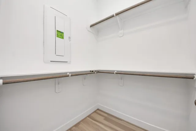 a bathroom with a double vanity sink mirror and