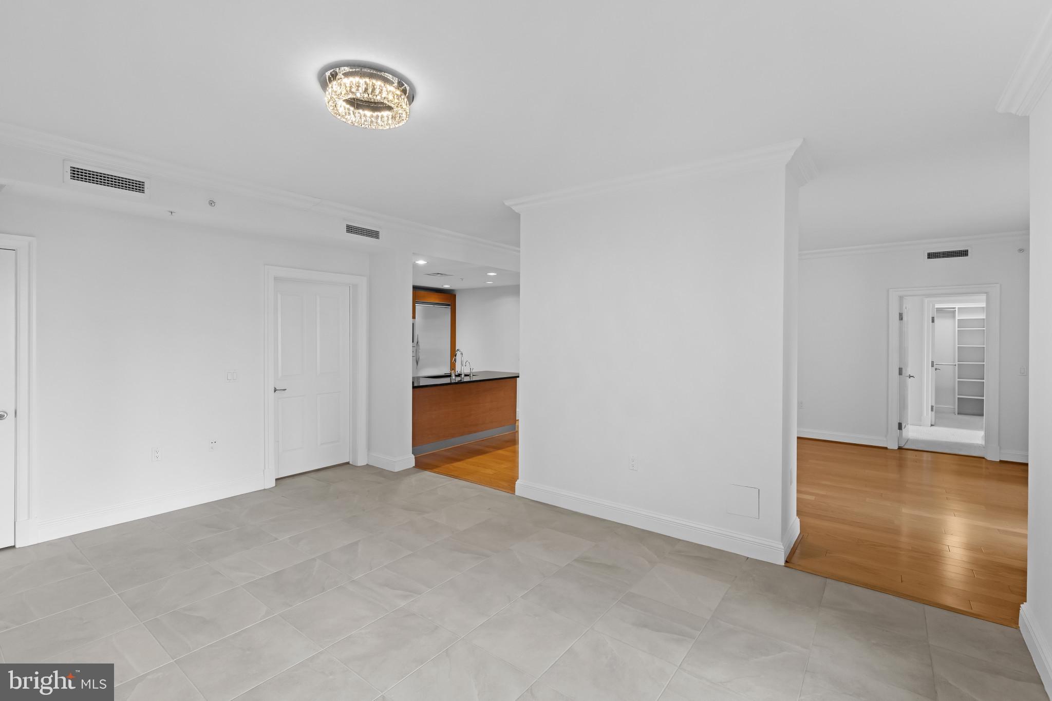 801 Key Highway, Unit 242 Baltimore, MD 21230 - Photo 21 of 52 a view of an empty room with a window