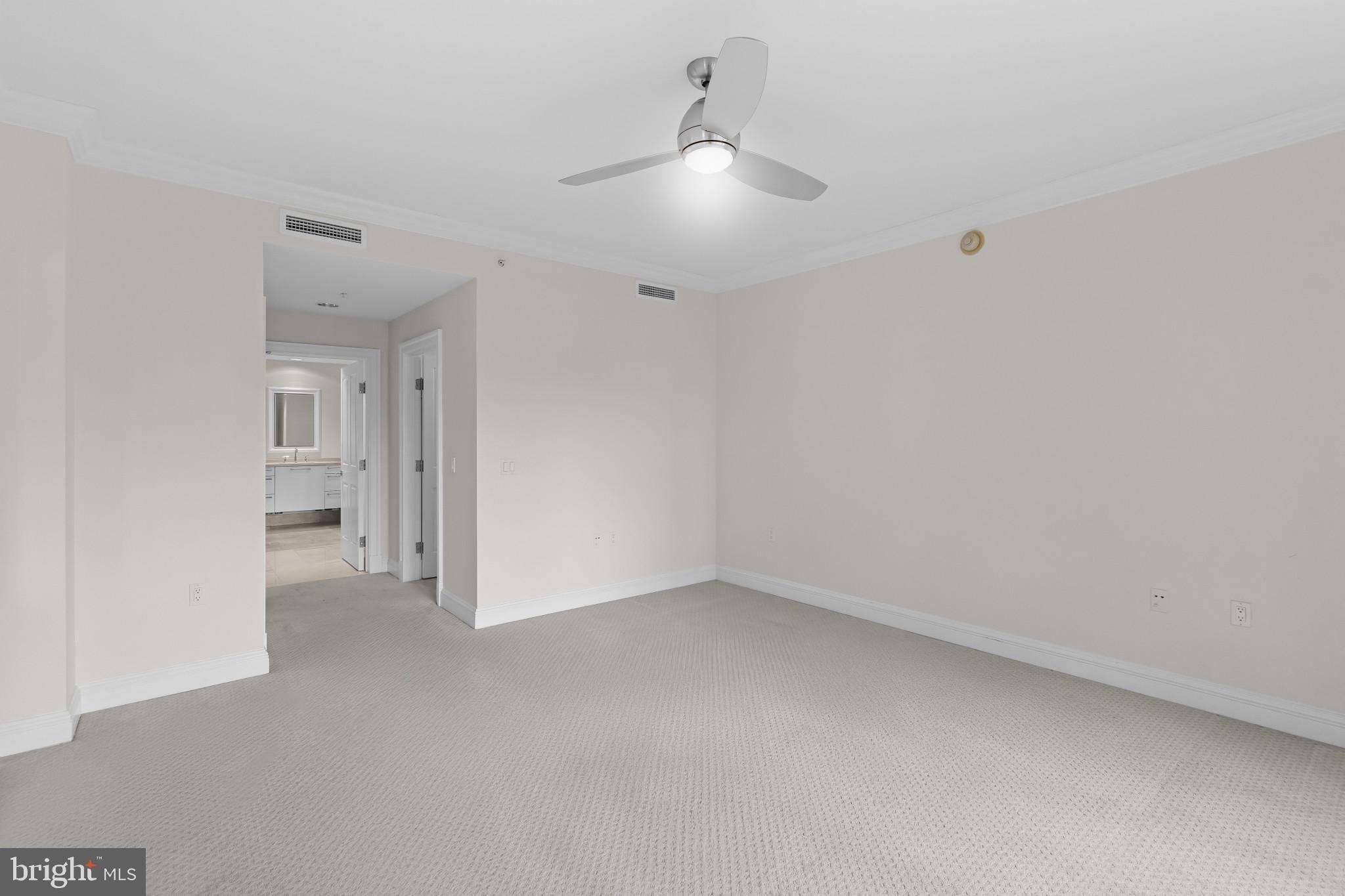 801 Key Highway, Unit 242 Baltimore, MD 21230 - Photo 28 of 52 a view of an empty room with a fan