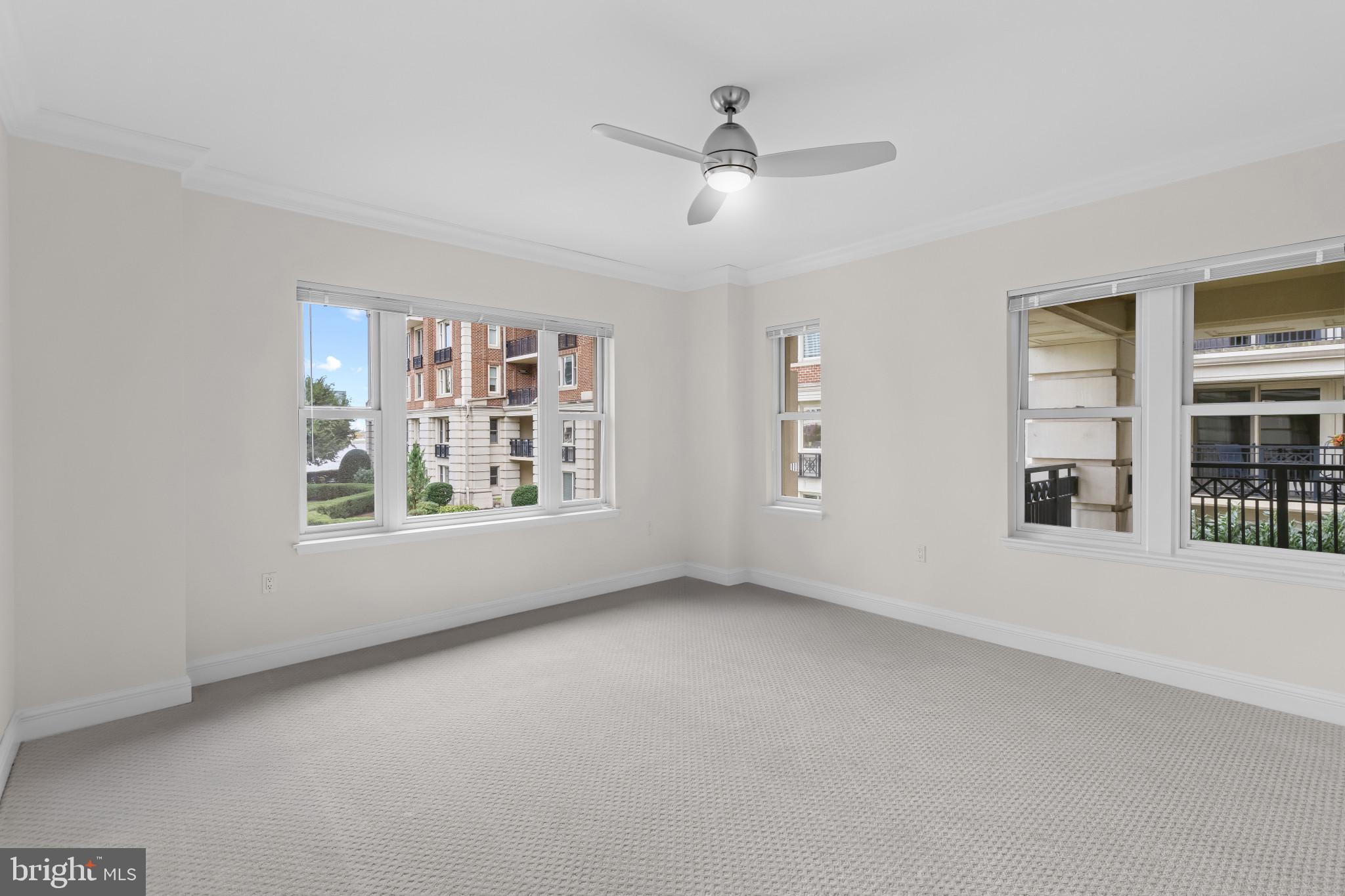 801 Key Highway, Unit 242 Baltimore, MD 21230 - Photo 30 of 52 a view of an empty room with a window