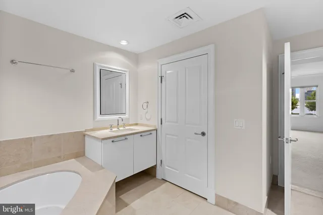 a view of a city with tall buildings