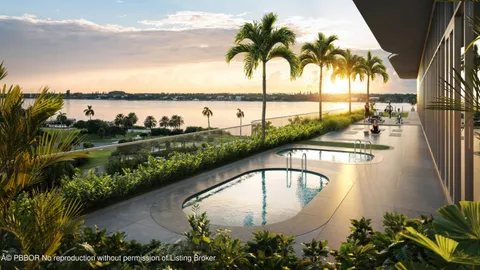 a view of swimming pool with a lake view