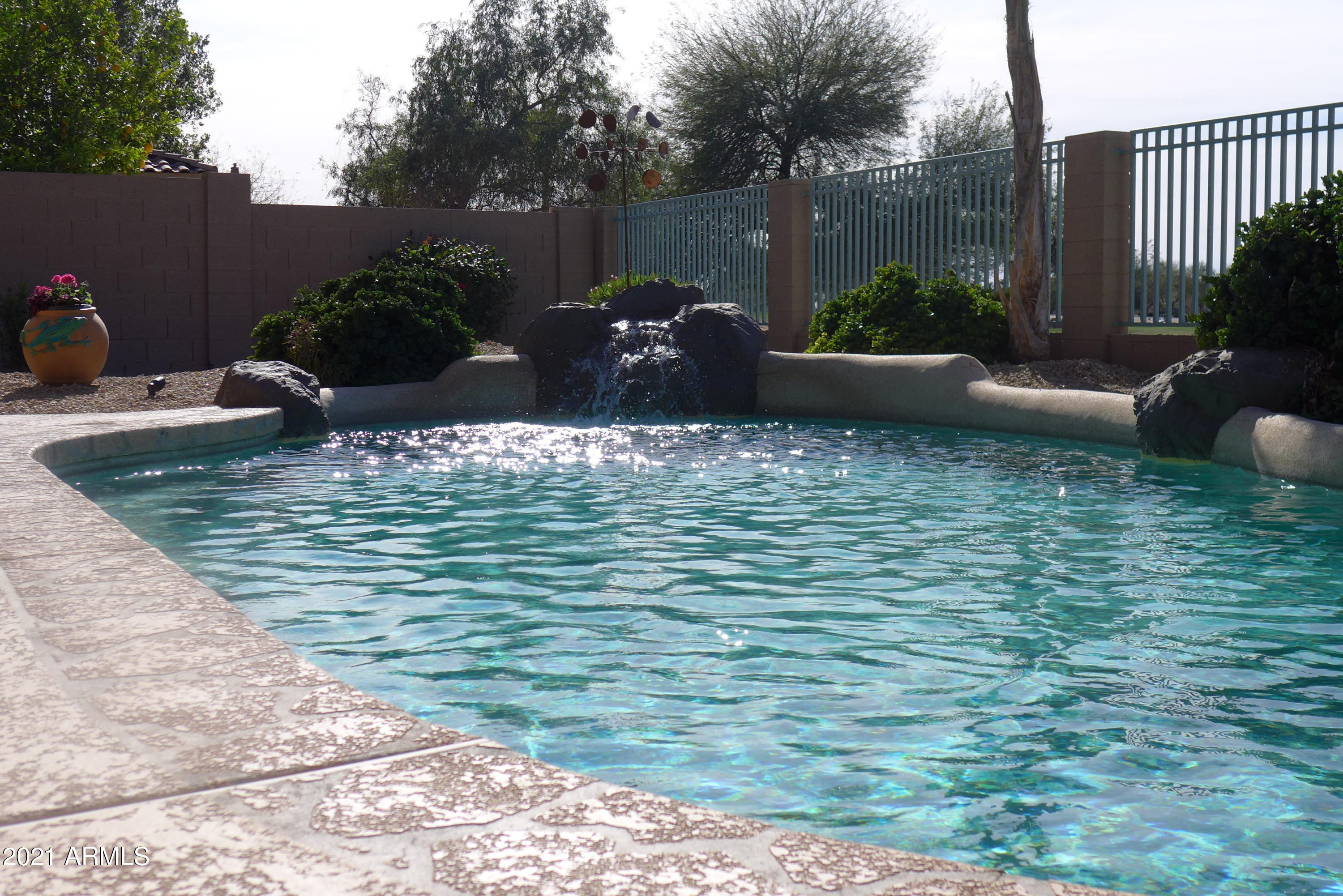 13620 Fairway Loop North Goodyear, AZ 85395 - Photo 4 of 45 Pool water feature