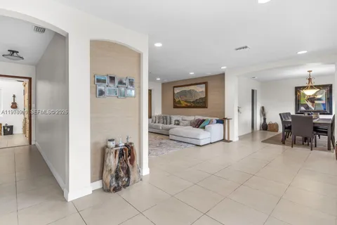 a living room with furniture and a couch