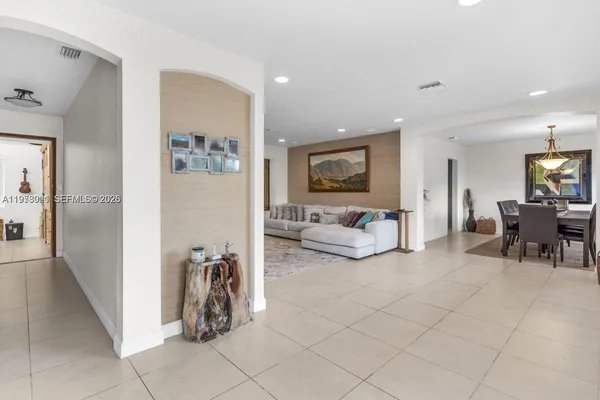 a living room with furniture and a couch