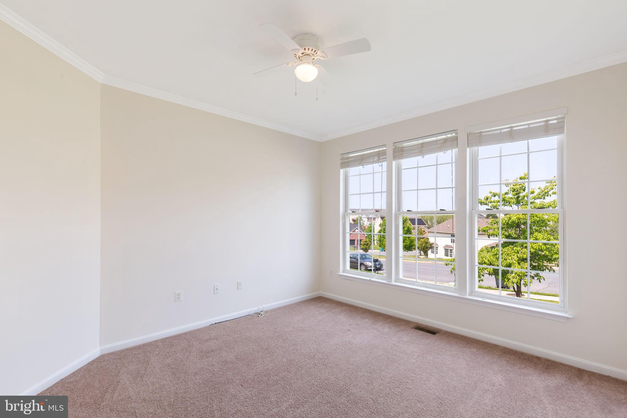 205 Tiger Way Boonsboro, MD 21713 - Photo 12 of 33 an empty room with windows and closet