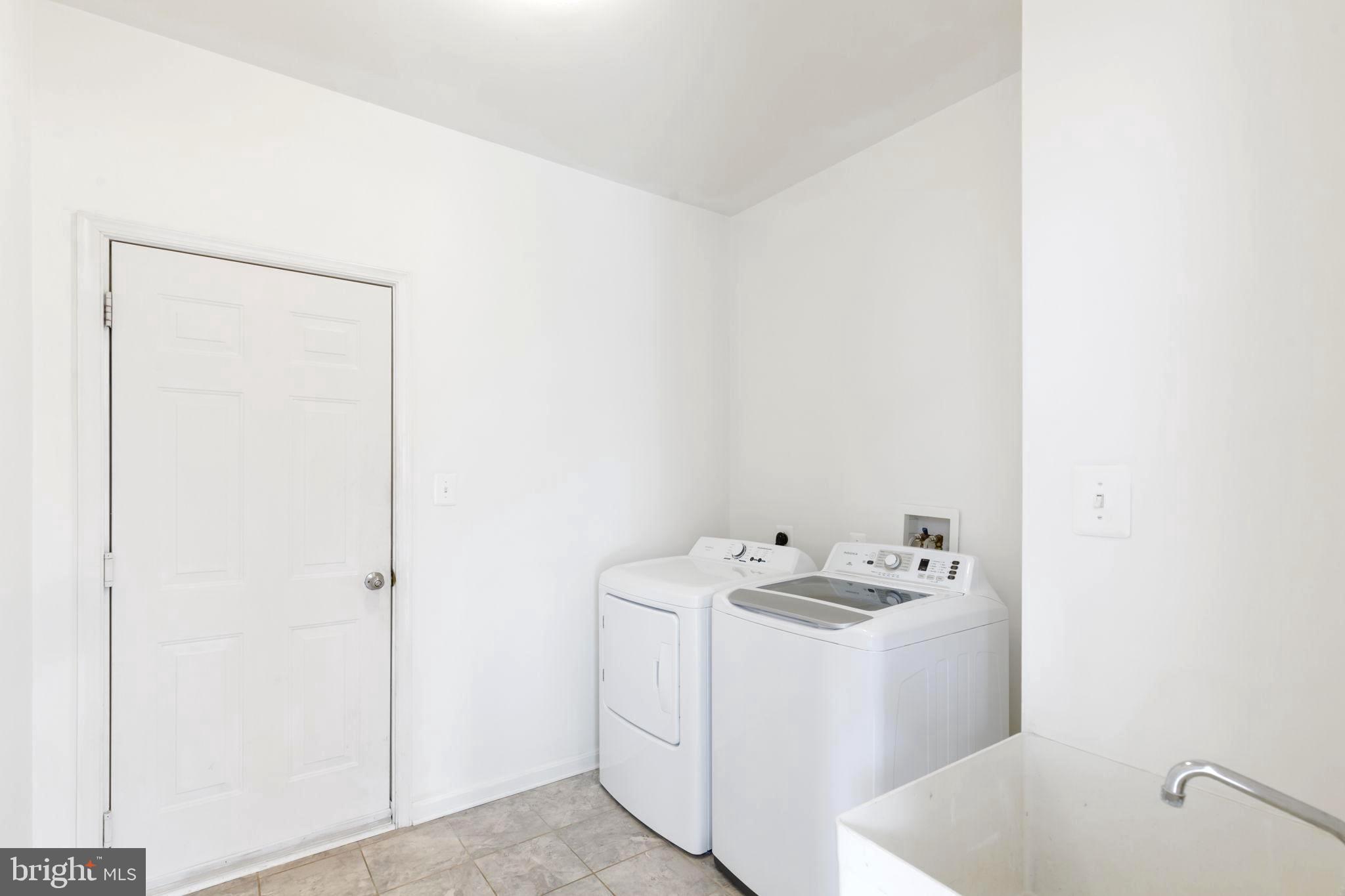 205 Tiger Way Boonsboro, MD 21713 - Photo 15 of 33 a utility room with dryer and washer