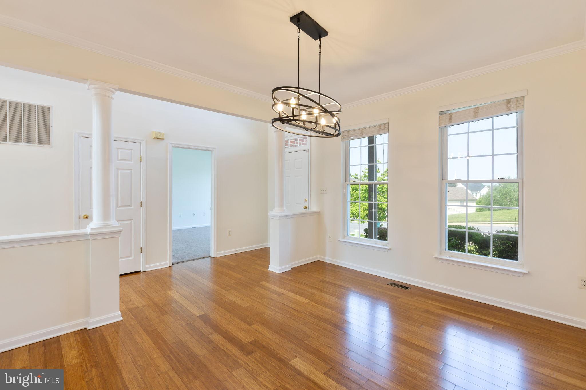 205 Tiger Way Boonsboro, MD 21713 - Photo 2 of 33 a view of an empty room with wooden floor and a window