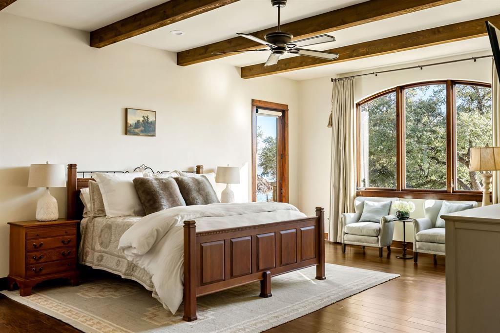 9930 Boat Club Road Fort Worth, TX 76179 - Photo 19 of 40 The primary bedroom in the main residence is a retreat in and of itself.