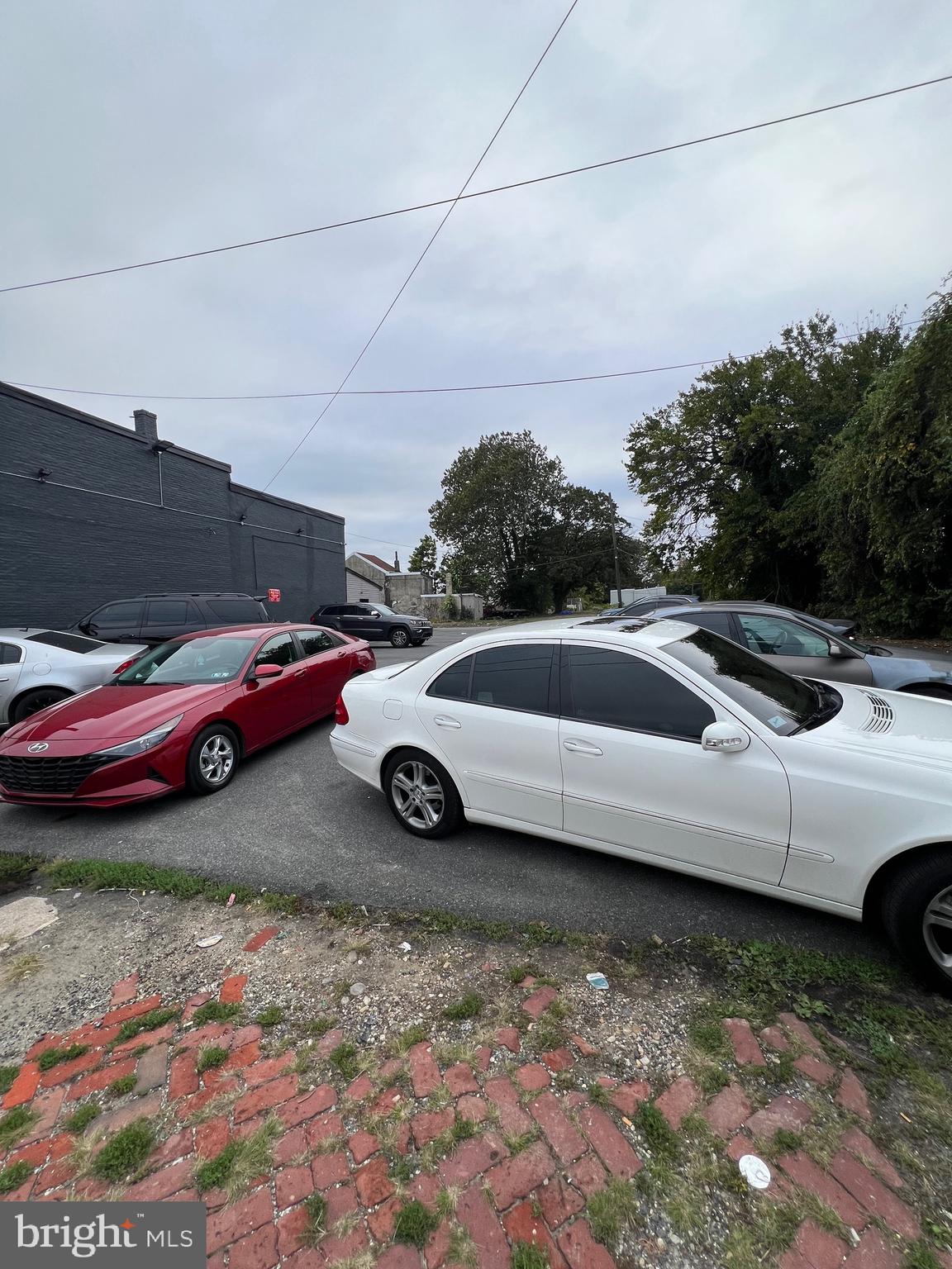 208 Kerlin Street Chester, PA 19013 - Photo 2 of 2 a view of a cars parked in a parking area