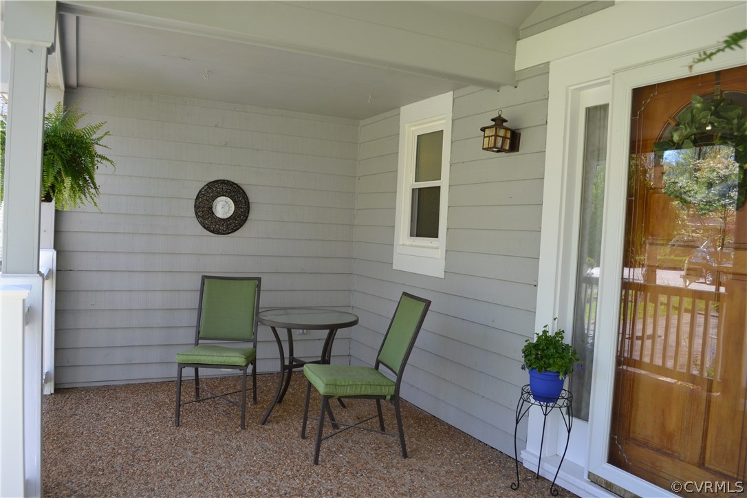 15012 Walnut Bend Road Midlothian, VA 23112 - Photo 2 of 27 a view of a house with backyard and sitting area