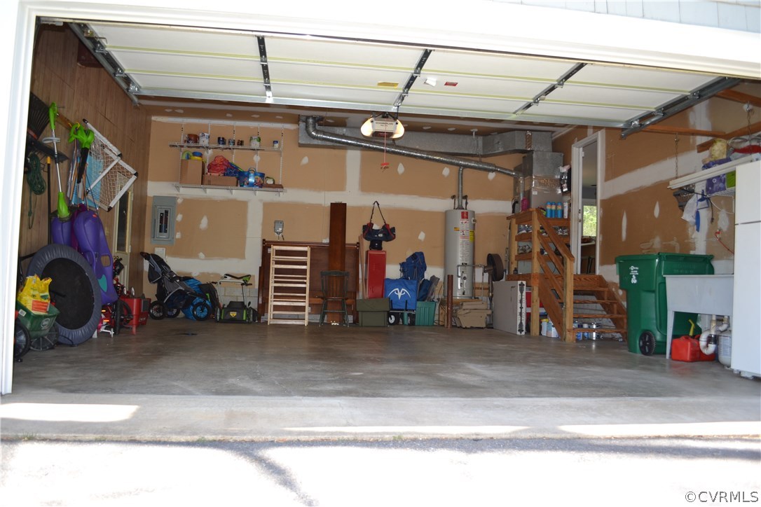 15012 Walnut Bend Road Midlothian, VA 23112 - Photo 23 of 27 a view of a garage with the white car