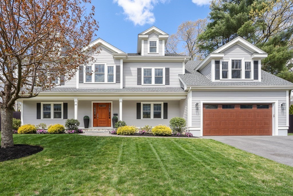 38 Glendale Road Needham, MA 02492 - Photo 1 of 35 a front view of a house with garden and porch