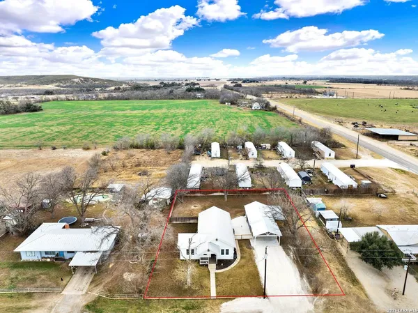 a terrace with outdoor seating and city view