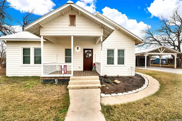 a front view of a house with a porch