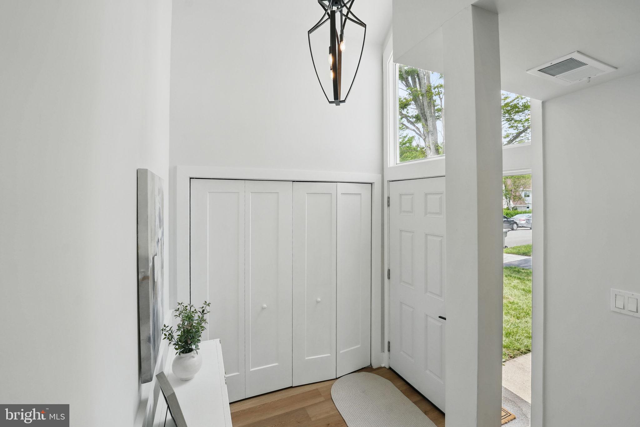 1496 Roundleaf Court Reston, VA 20190 - Photo 8 of 53 Two story foyer