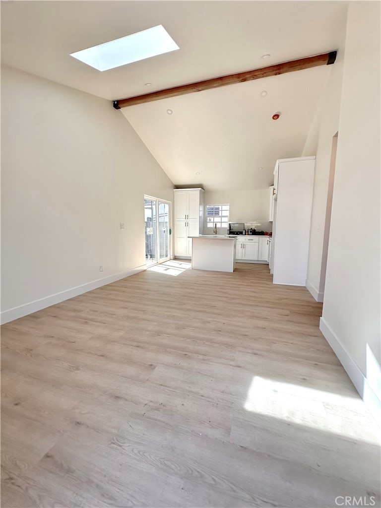 1543 Delford Avenue, Unit 1/2 Duarte, CA 91010 - Photo 2 of 16 a view of a kitchen with furniture and wooden floor