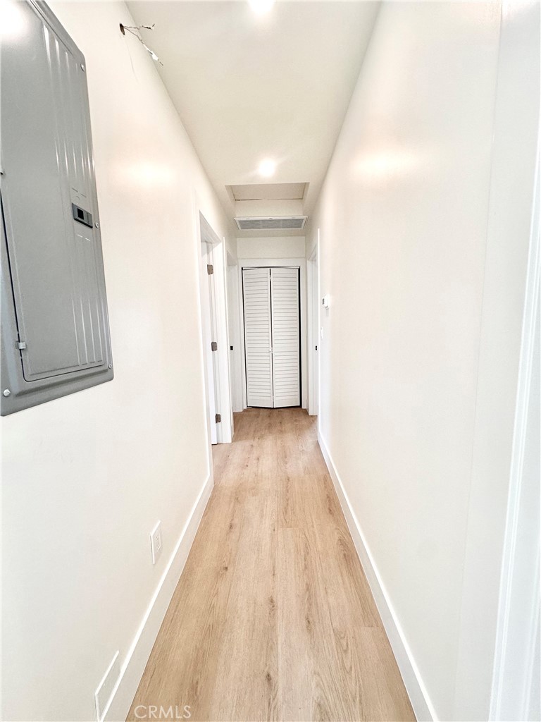 1543 Delford Avenue, Unit 1/2 Duarte, CA 91010 - Photo 6 of 16 a view of a hallway with wooden floor