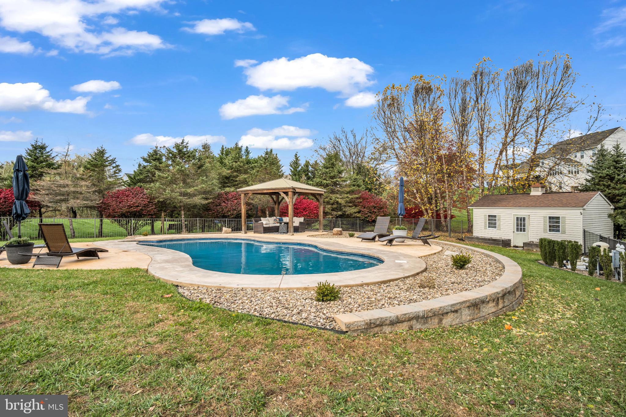 6014 Three Rivers Drive Harrisburg, PA 17112 - Photo 44 of 49 Serene backyard oasis with inviting pool.