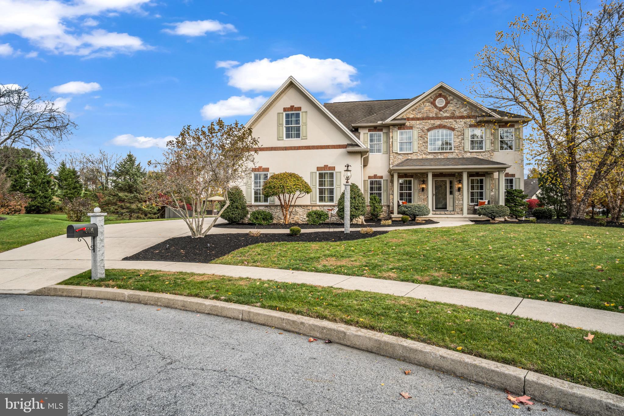 6014 Three Rivers Drive Harrisburg, PA 17112 - Photo 5 of 49 Elegant home with lush landscaping.