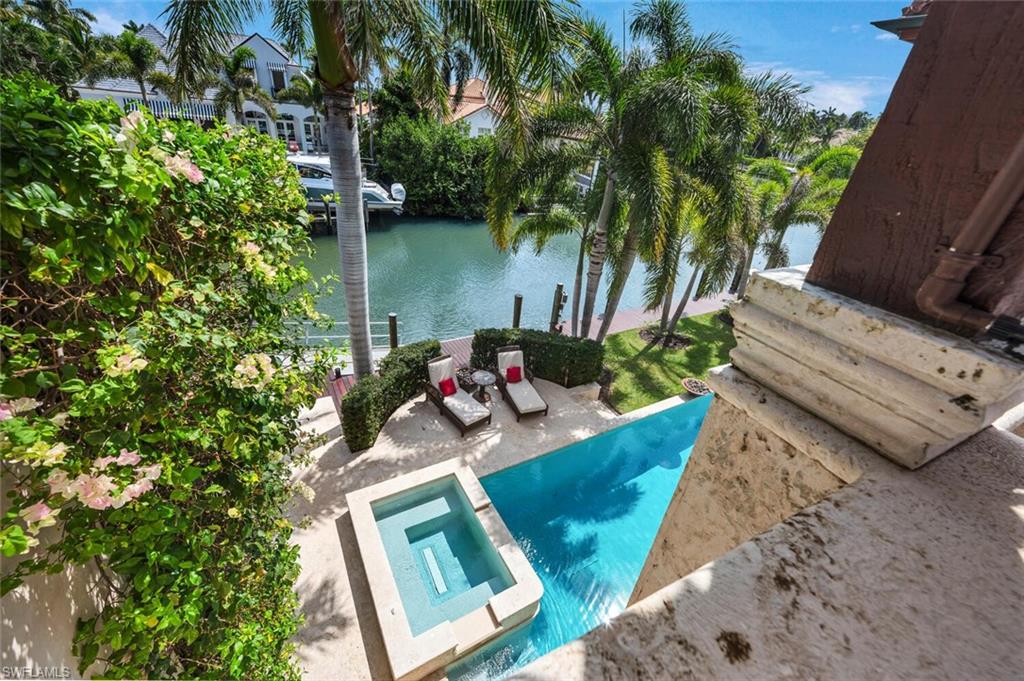 2233 Forrest Lane Naples, FL 34102 - Photo 15 of 48 a view of yard from outdoor seating