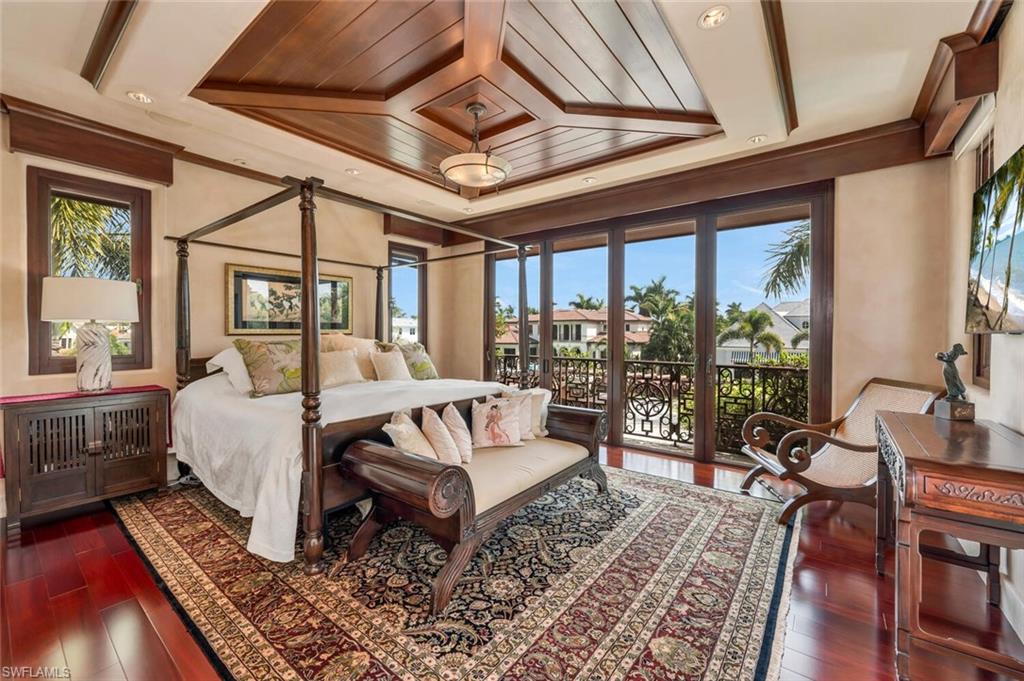 2233 Forrest Lane Naples, FL 34102 - Photo 32 of 48 a bed room with furniture and a large window