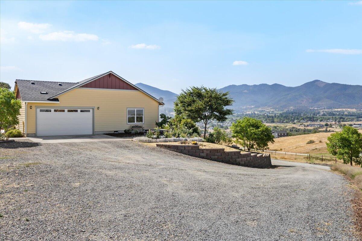 Spacious parking area and garage