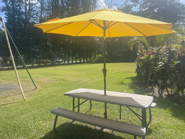 a view of swimming pool and outdoor seating