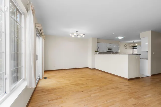a view of a kitchen with a refrigerator a kitchen view and a refrigerator
