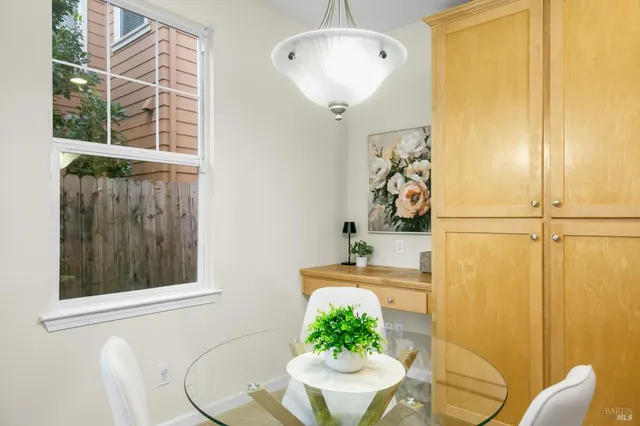 a view of entryway with wooden floor and stairs