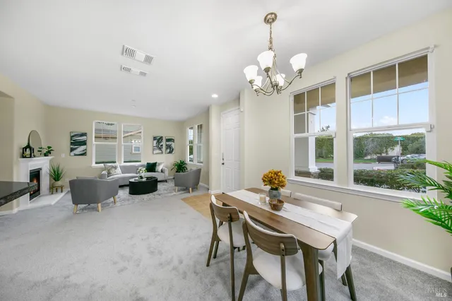a en suite bathroom with a double vanity sink and a mirror