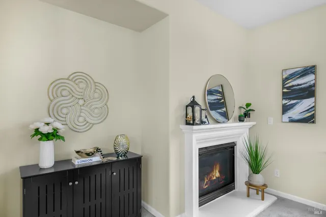 a white bath tub sitting next to a white sink and a shower