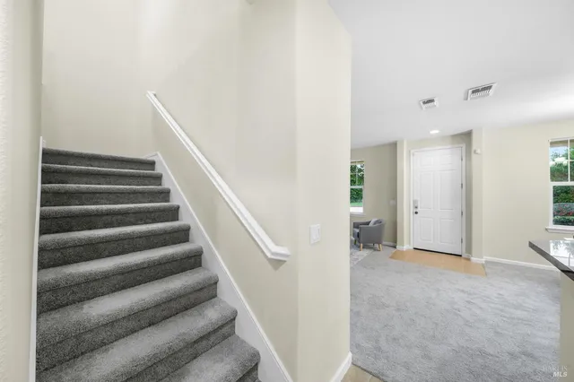a bathroom with a tub and shower