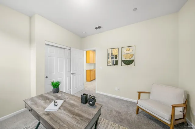 an aerial view of a house with a garden