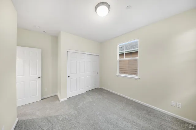 an aerial view of a house with a swimming pool
