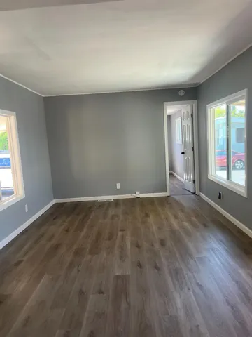 a view of an empty room and window