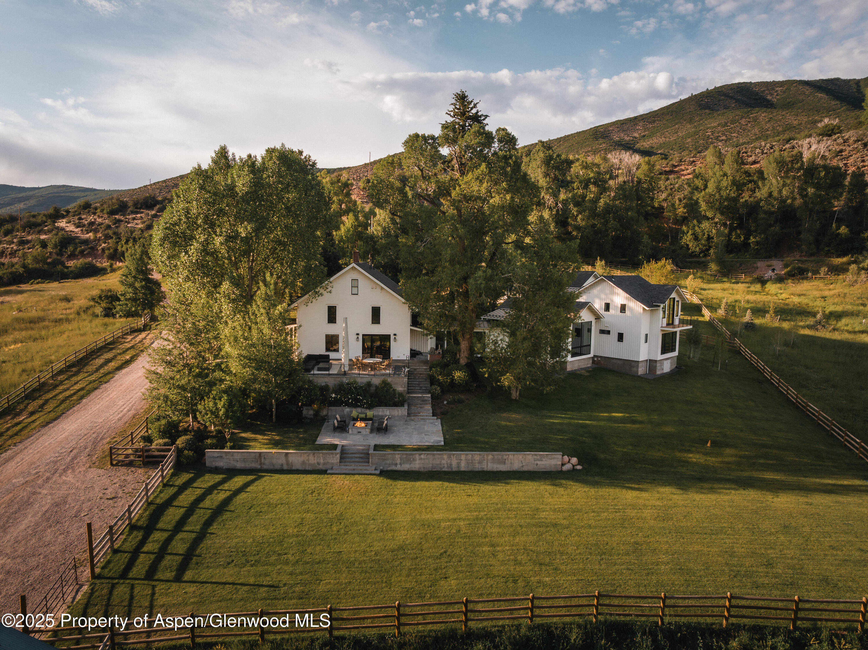 1814 Woody Creek Road Aspen, CO 81612 - Photo 1 of 52 a view of a house with a yard