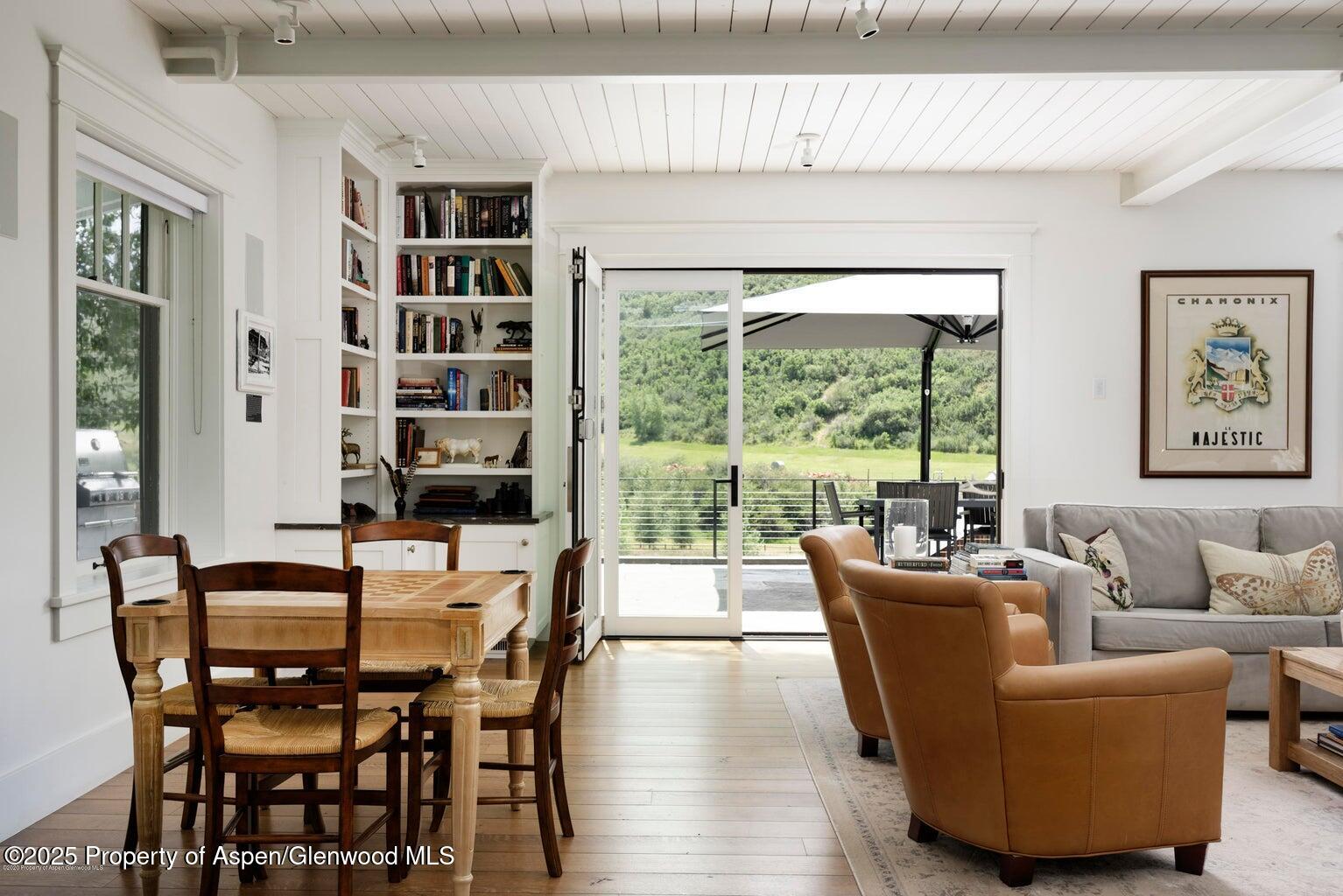1814 Woody Creek Road Aspen, CO 81612 - Photo 17 of 52 a living room with furniture and a large window