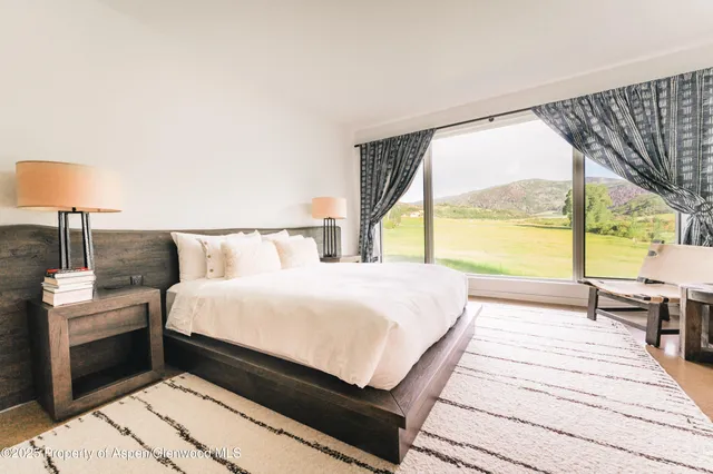 a view of a balcony with a floor to ceiling window