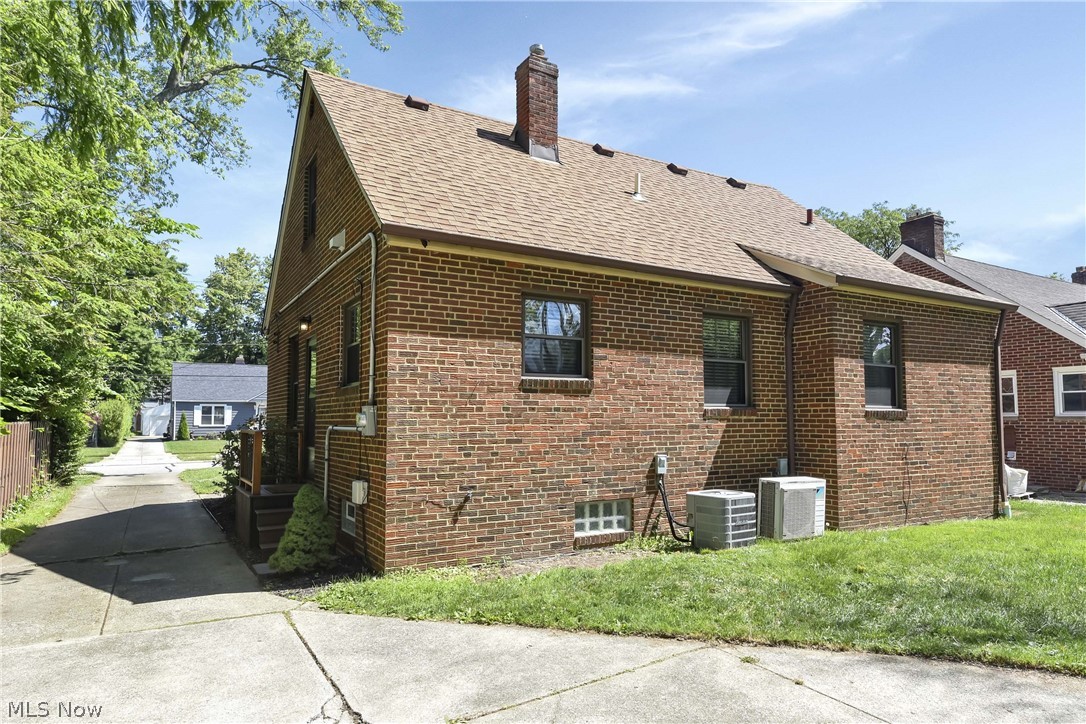 21483 Eaton Road Cleveland, OH 44126 - Photo 5 of 25 View of property exterior featuring central AC