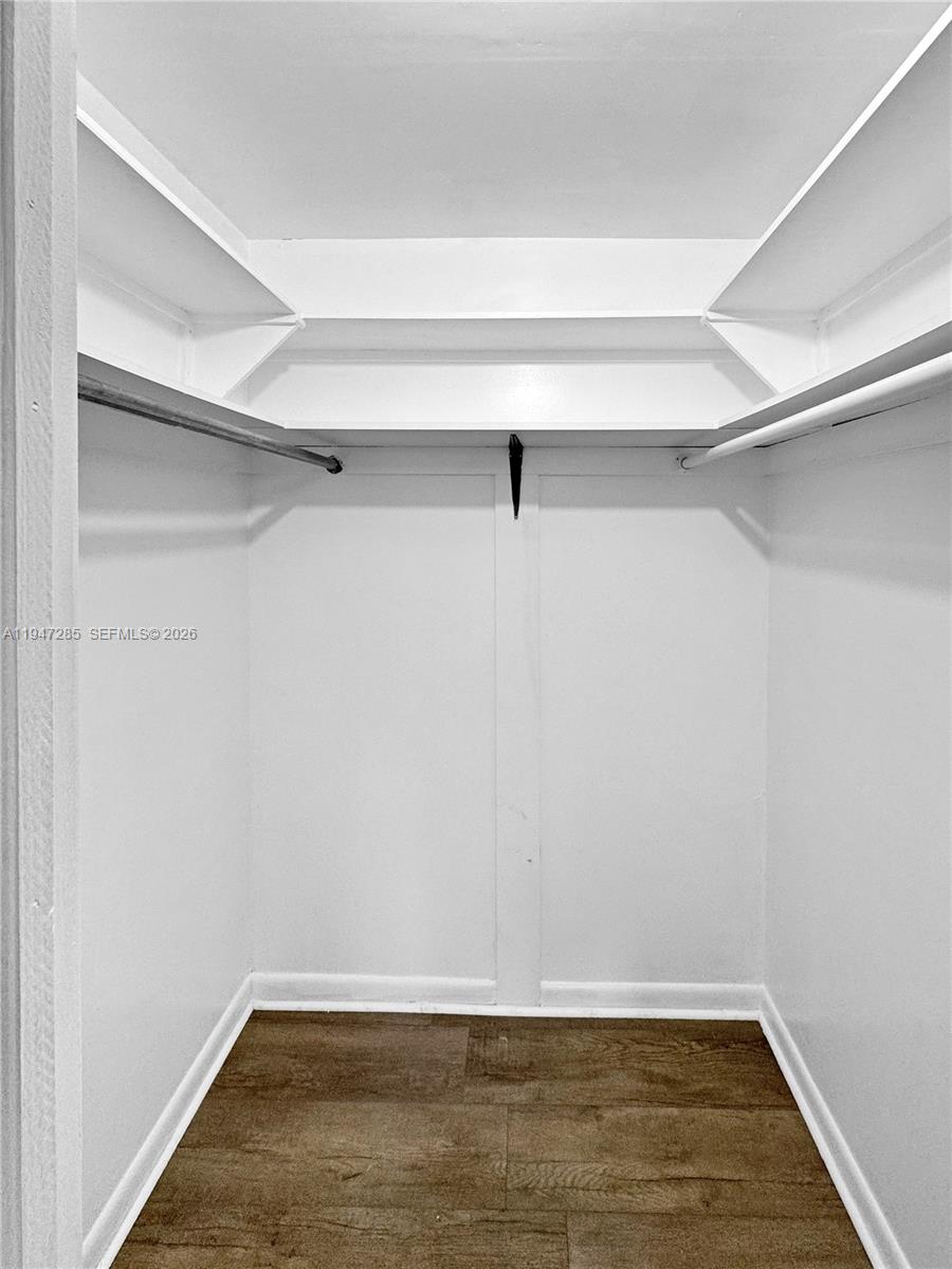 883 Southwest 10th Street, Unit 1 Pompano Beach, FL 33060 - Photo 6 of 20 a view of a room with wooden floor