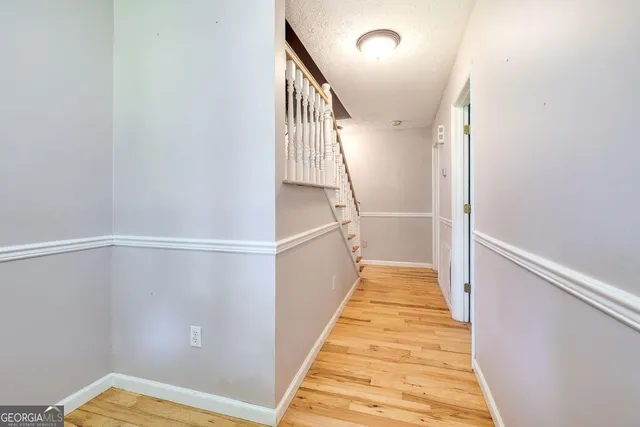 a view of entryway with wooden floor