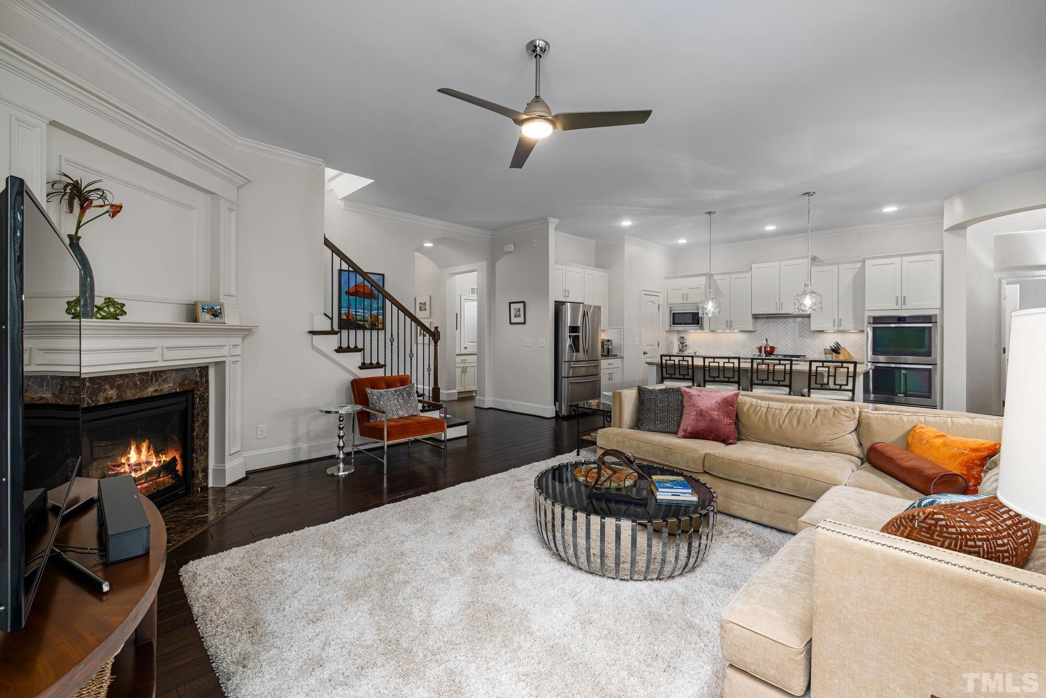 4526 Farrington Road Durham, NC 27707 - Photo 7 of 42 a living room with furniture and kitchen view