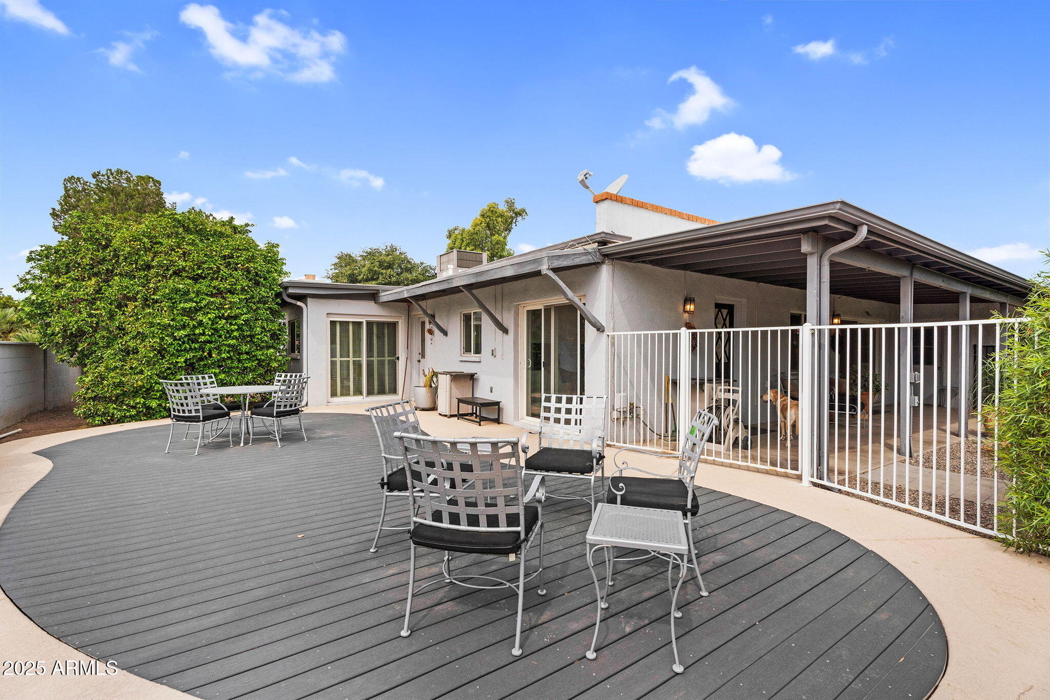 1515 West Palmaire Avenue Phoenix, AZ 85021 - Photo 20 of 23 a view of a house with patio and wooden floor
