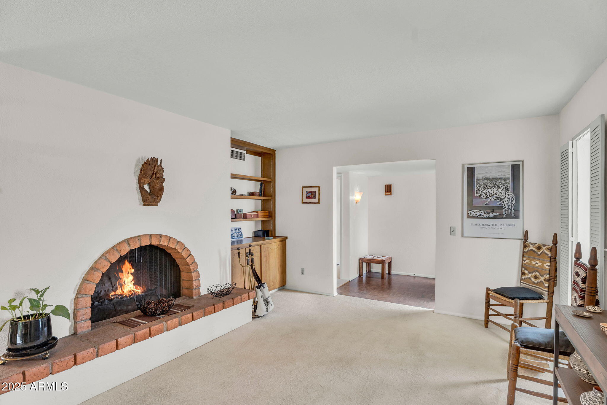 1515 West Palmaire Avenue Phoenix, AZ 85021 - Photo 7 of 23 a living room with furniture and a mirror