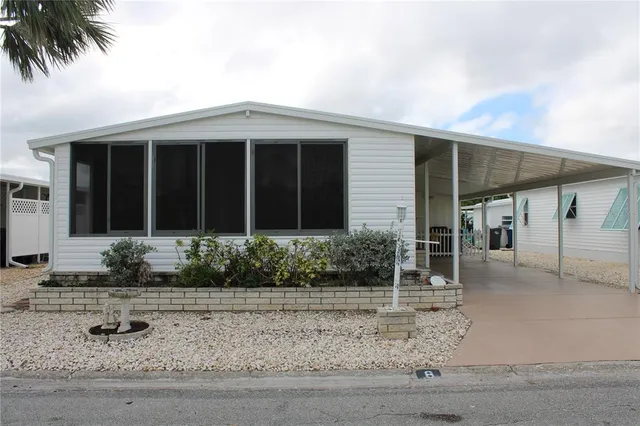 a view of a house with a patio