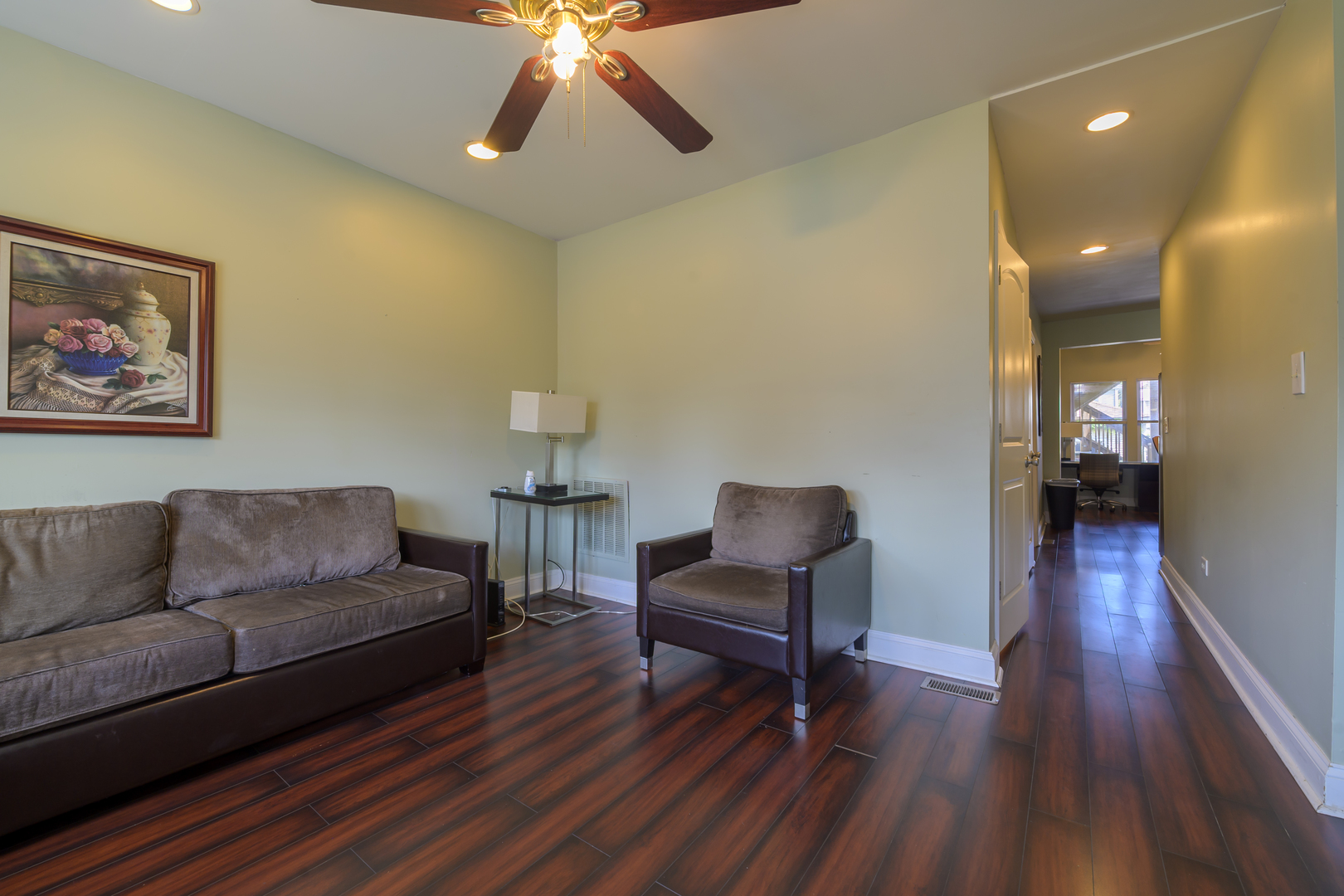 2436 West Fillmore Street Chicago, IL 60612 - Photo 5 of 44 a living room with furniture and a wooden floor