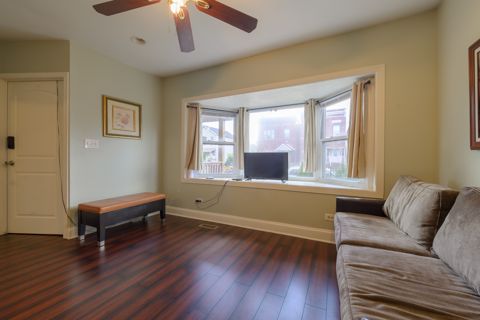 2436 West Fillmore Street Chicago, IL 60612 - Photo 6 of 44 a living room with furniture and a window
